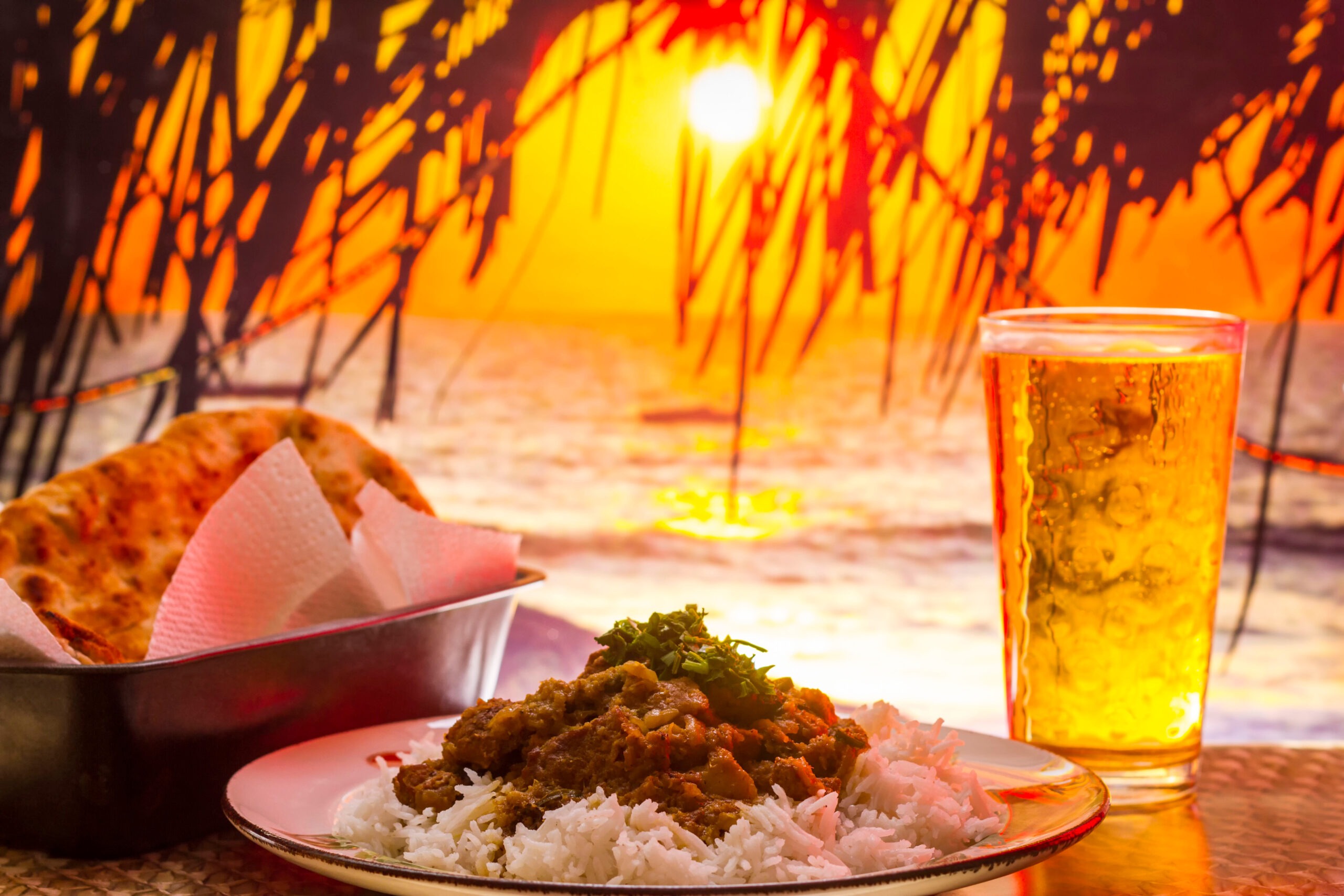 Holiday,Food,,Indian,Curry,With,Sunset,In,The,Background